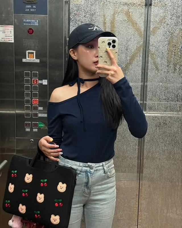 正韓不對稱露單斜肩顯瘦長綁帶掛脖上衣