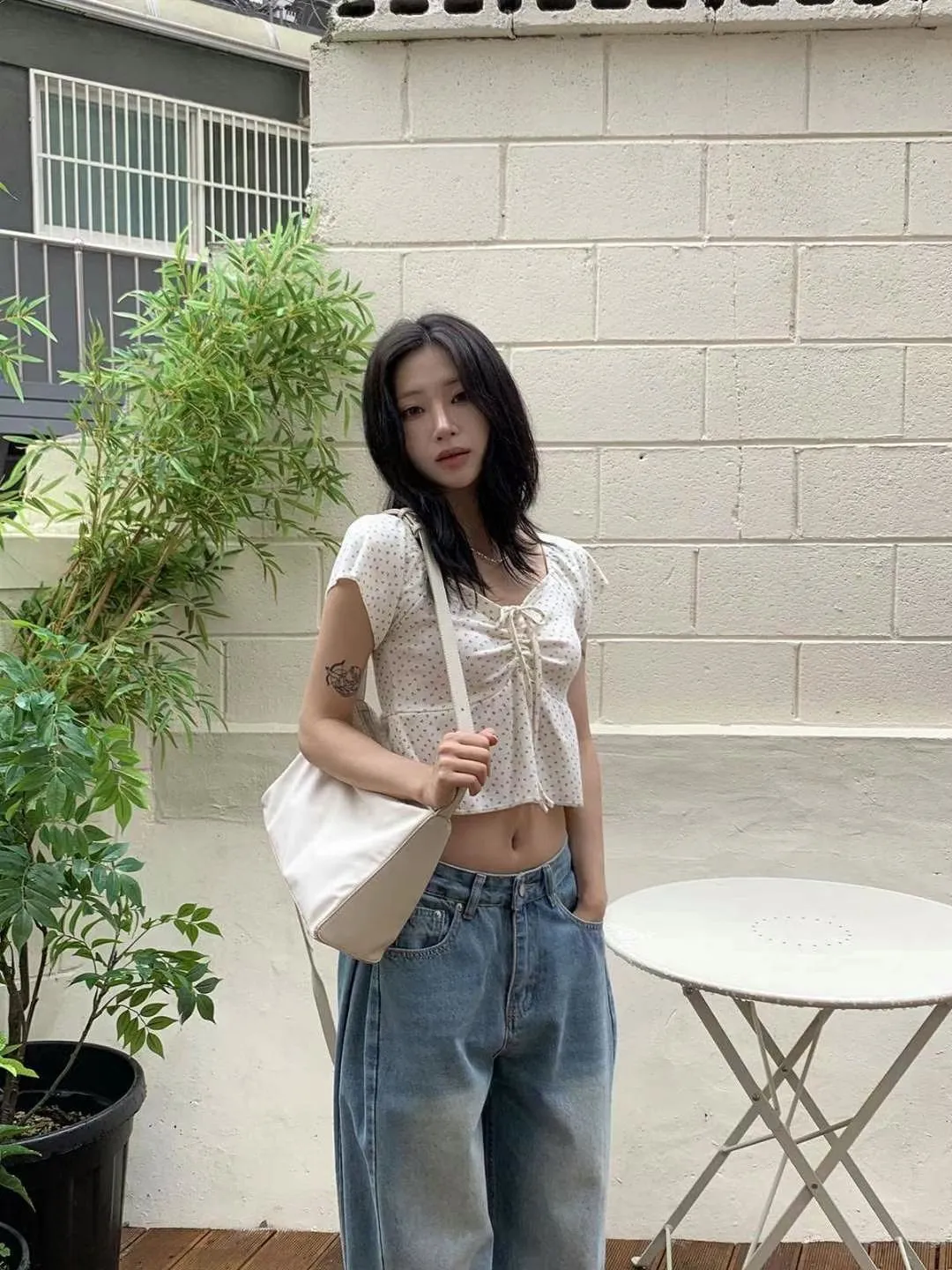 正韓碎花胸前綁帶小傘擺上衣