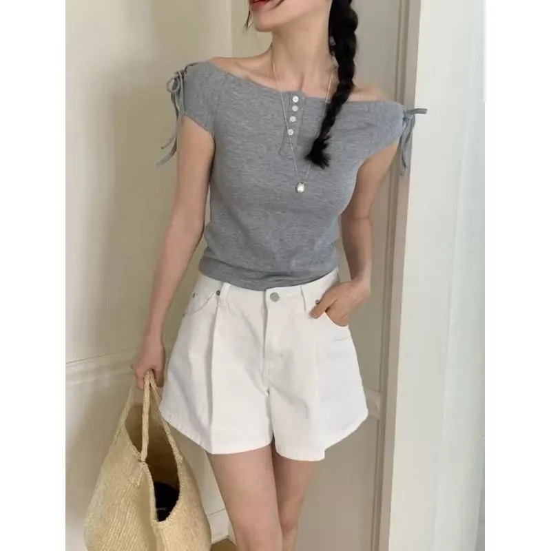 正韓 一字領肩蝴蝶結排釦上衣