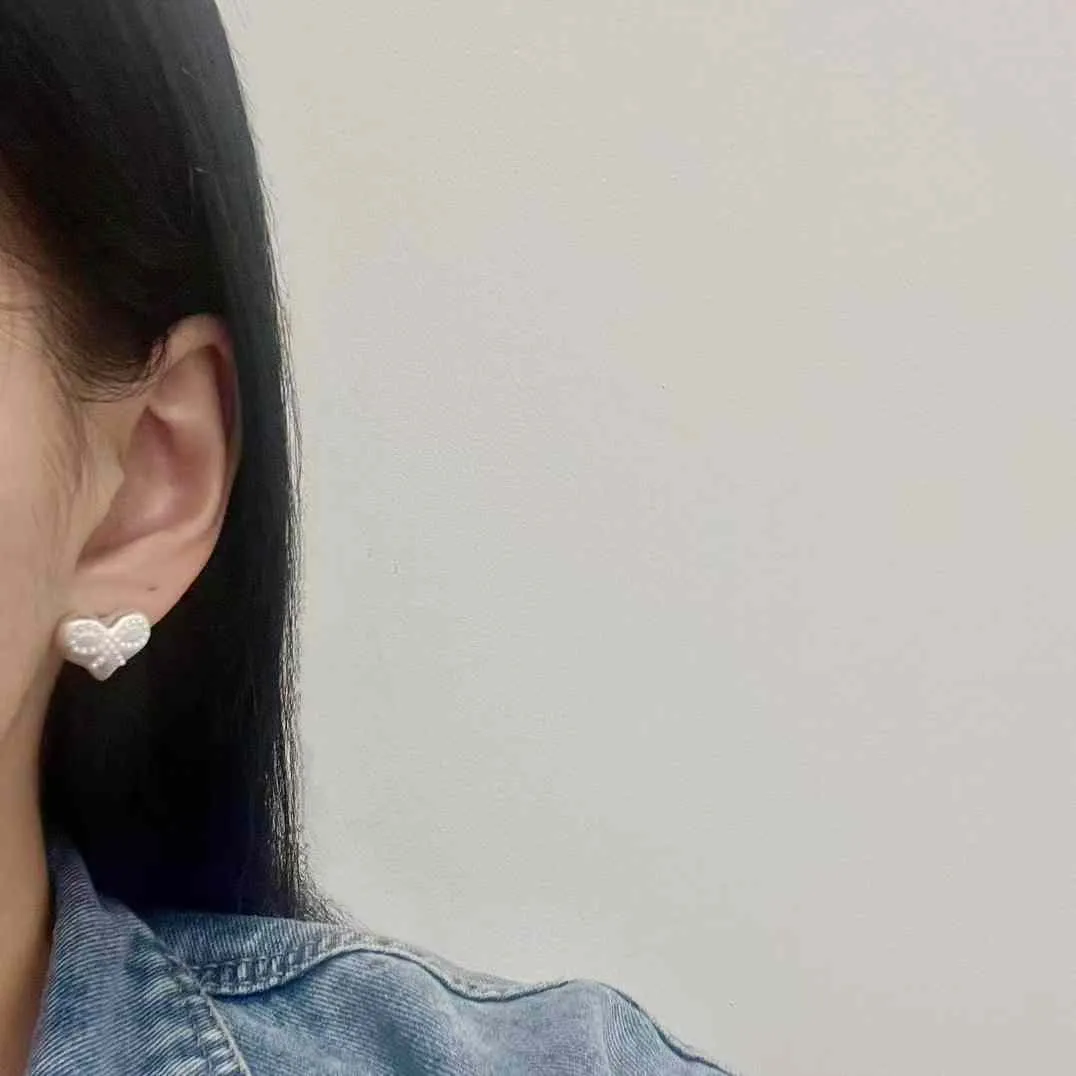 925純銀針蝴蝶結愛心耳釘