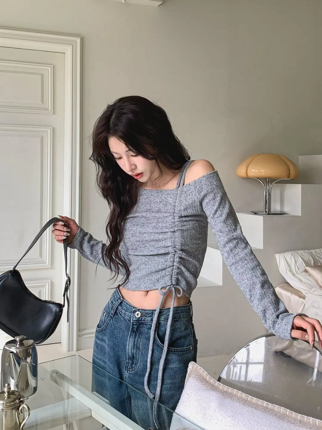 正韓露肩線條綁帶針織上衣