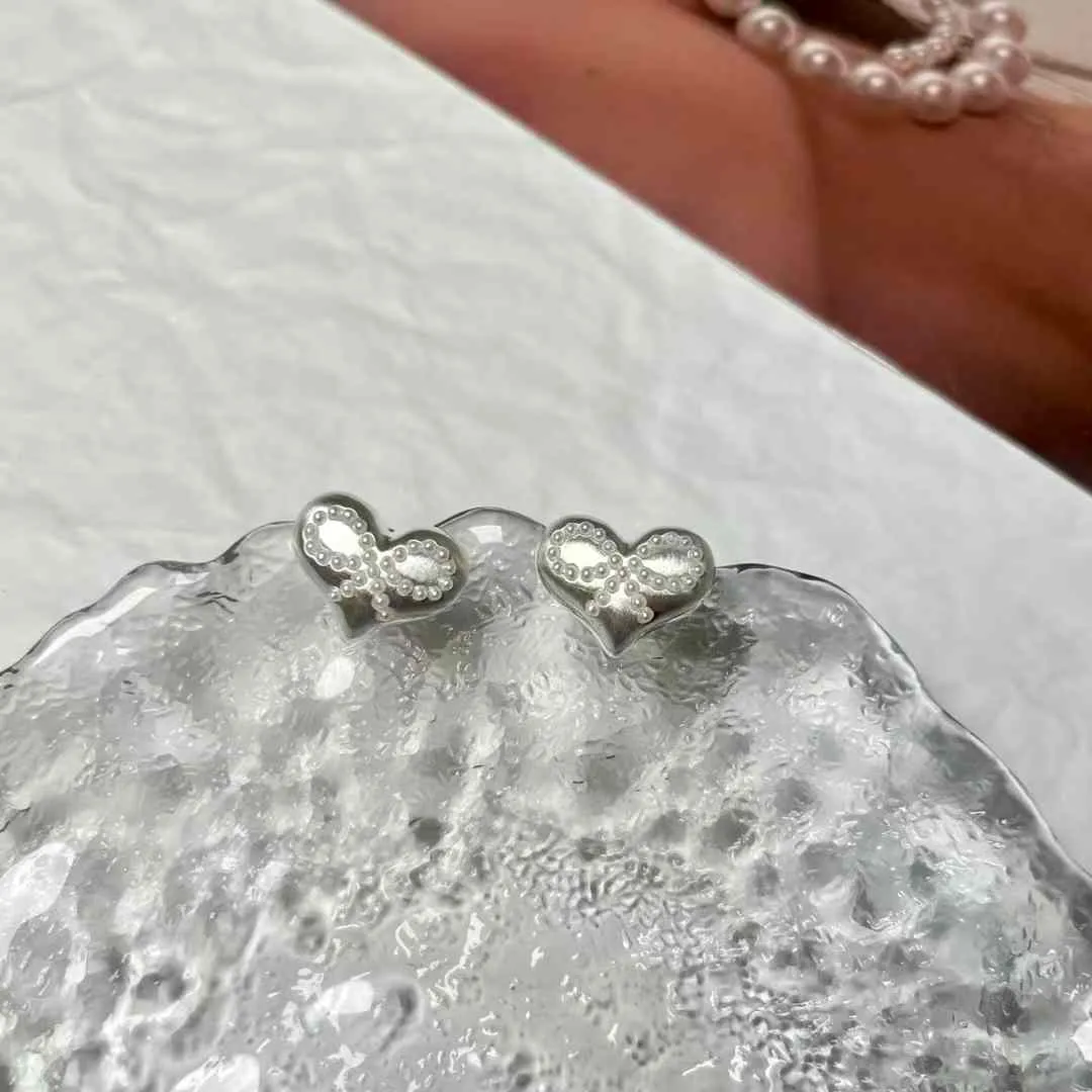 925純銀針蝴蝶結愛心耳釘