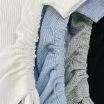 正韓翻領拉鍊側抓皺綁帶上衣