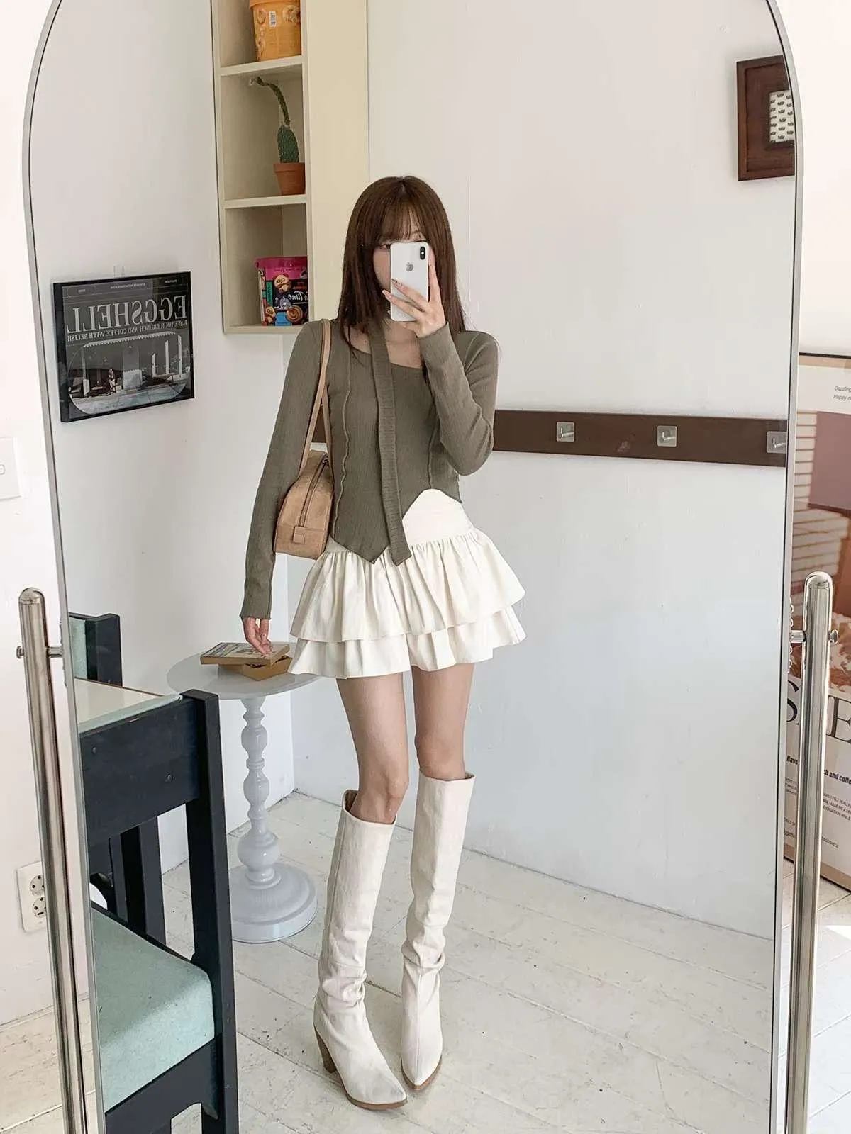 正韓附飄帶立體線條不規則下擺上衣