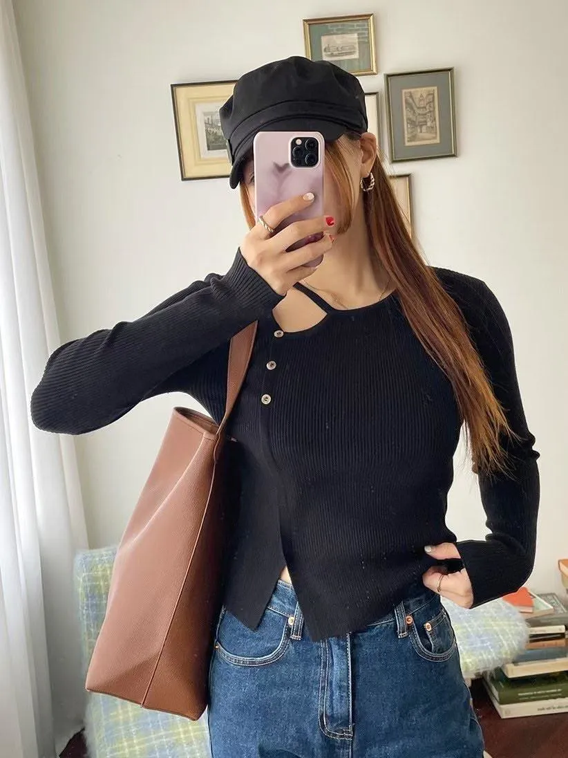 正韓直紋不規則鏤空排釦上衣