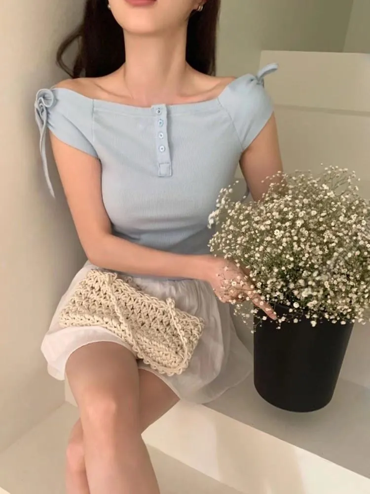 正韓 一字領肩蝴蝶結排釦上衣